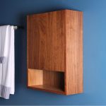 Wall-mounted storage cabinet with one door and one adjustable wood shelf,  …