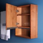 Wall-mounted storage cabinet with one door and one adjustable wood shelf,  …