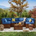 Marenna 7 Piece Slanted Back Rattan Sectional Seating Group with Cushions